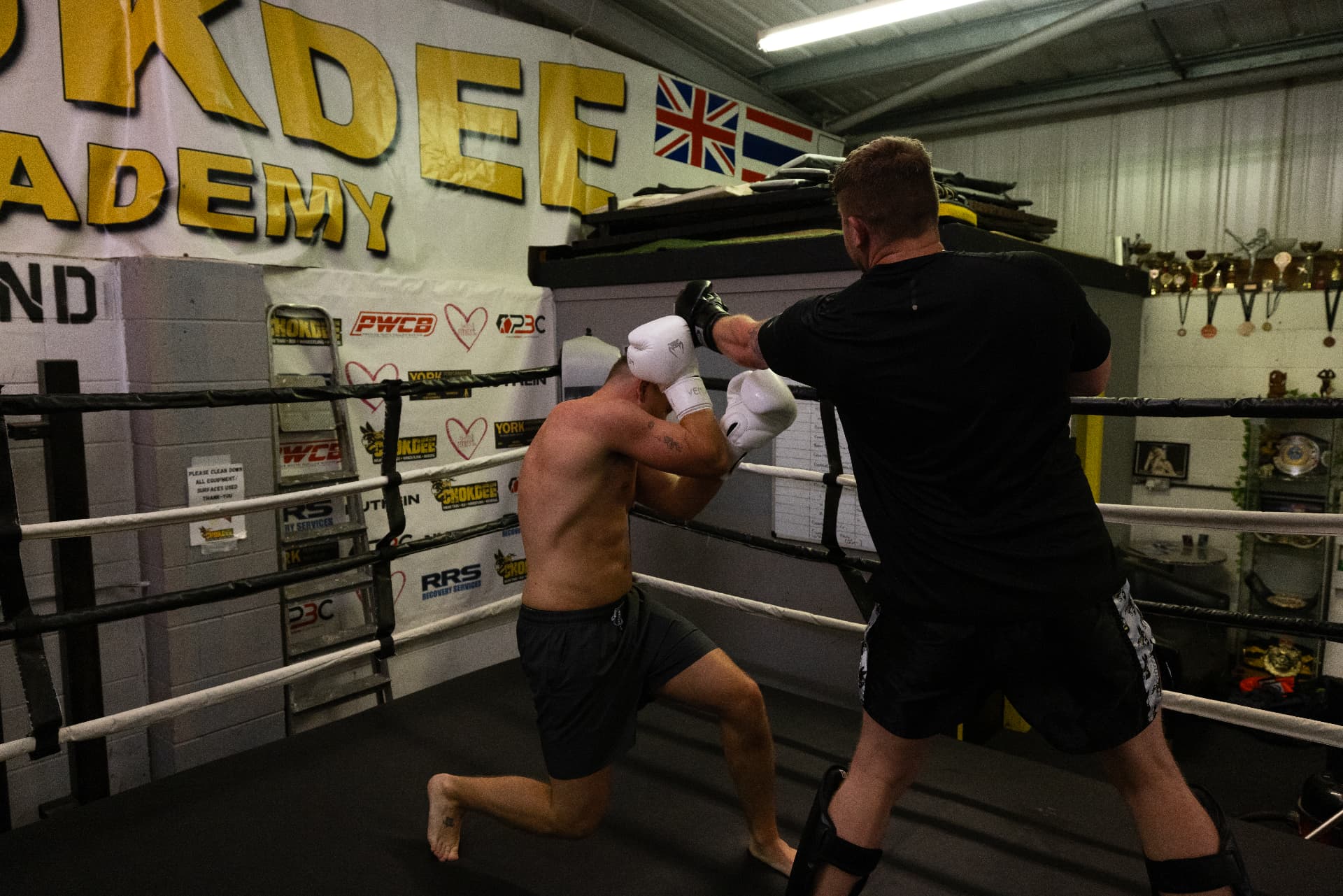 Member slipping a punch and countering in the ring