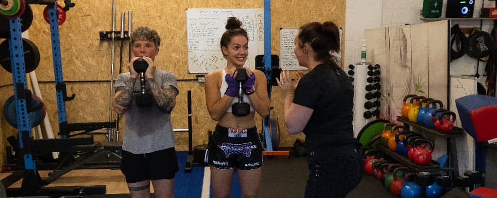 Women training with kettlebells in the Chokdee strength and conditioning area