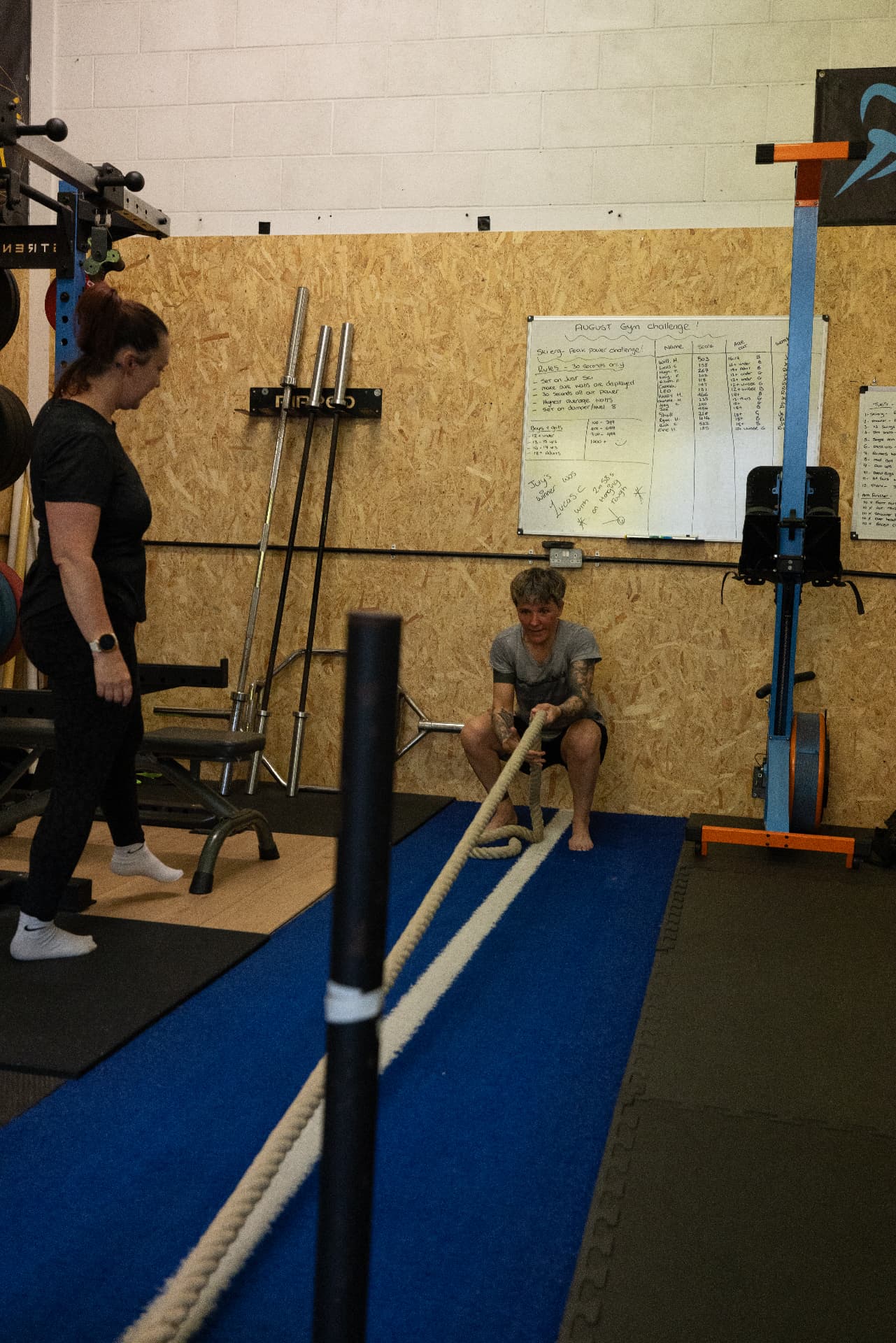 Member pulling a sled rope during the monthly gym challenge