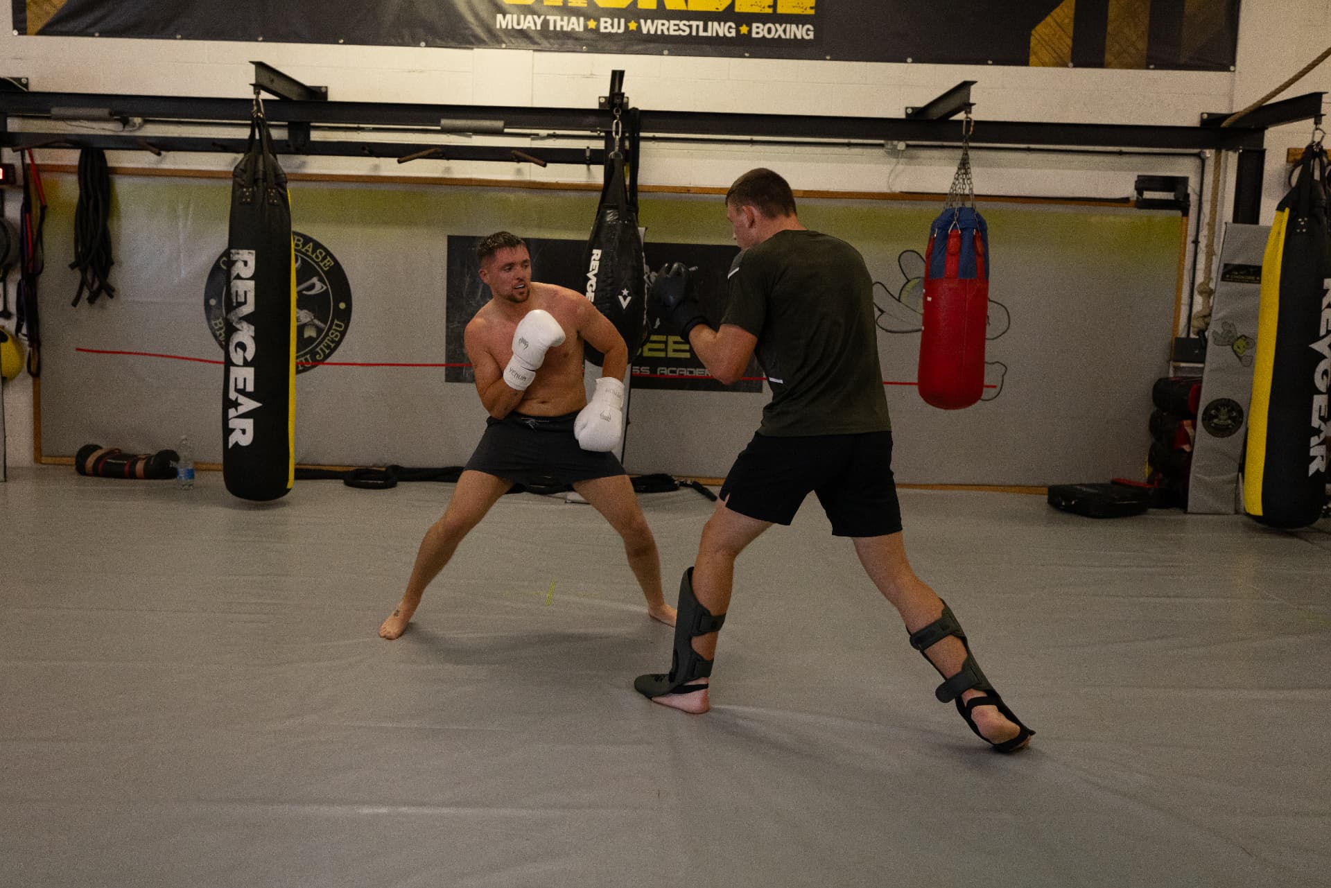 Members squaring off in stance during a light sparring round