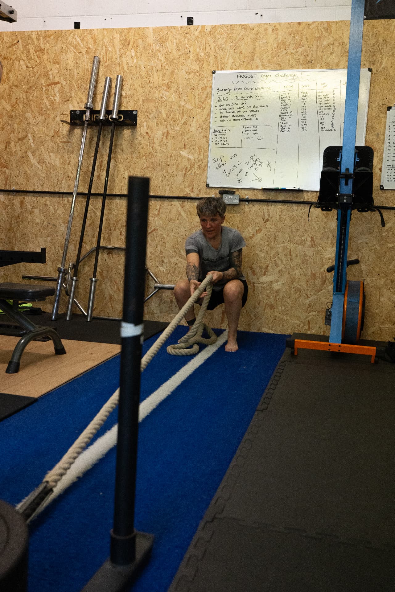 Member digging in on a heavy rope pull in the conditioning zone